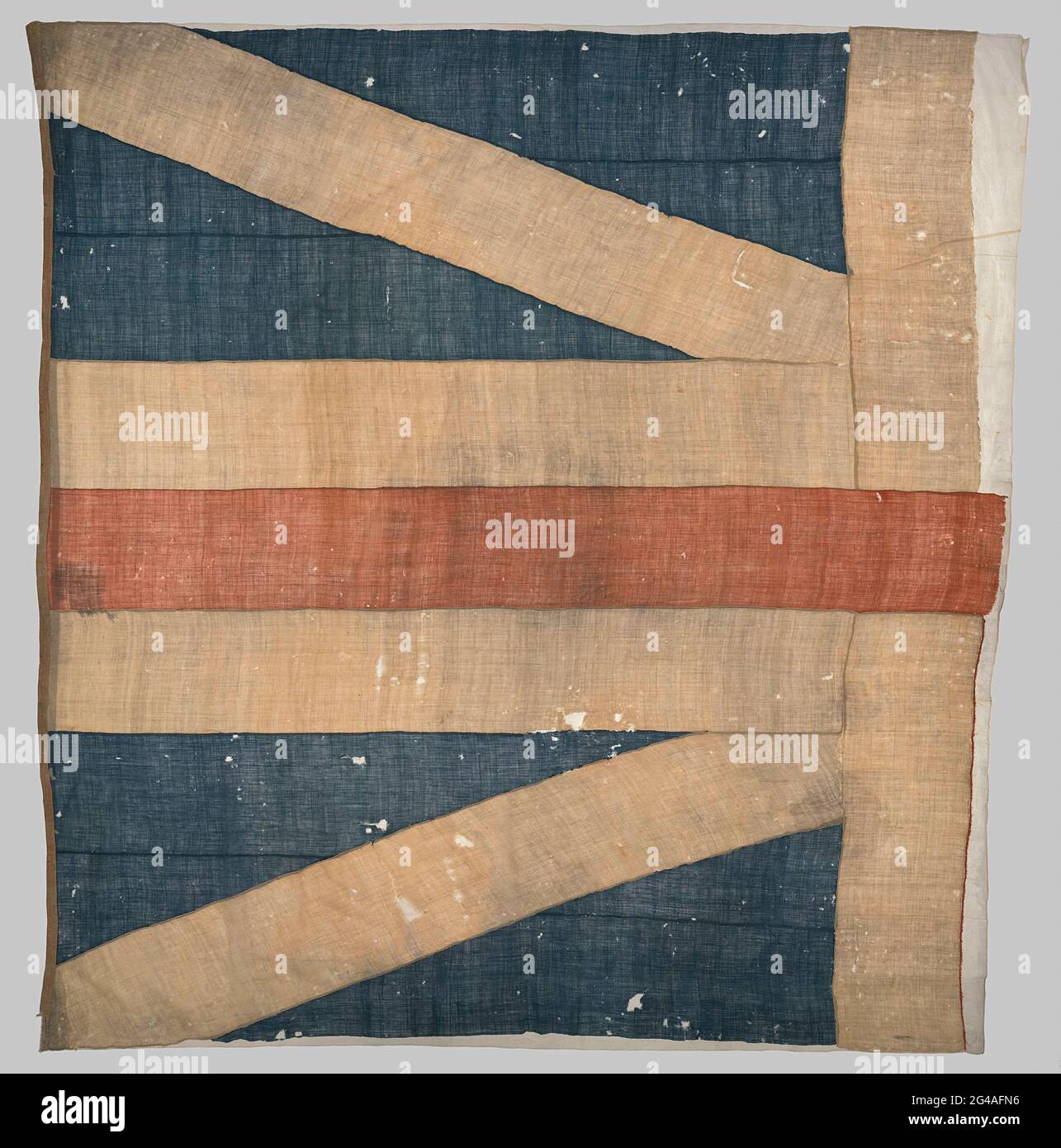 Fragment d'un drapeau de navire. Plus la moitié d'un drapeau de navire, bleu avec un rouge dans une croix blanche sur une croix blanche andries. C'est un drapeau syndical anglais de la période 1606-1700. Banque D'Images