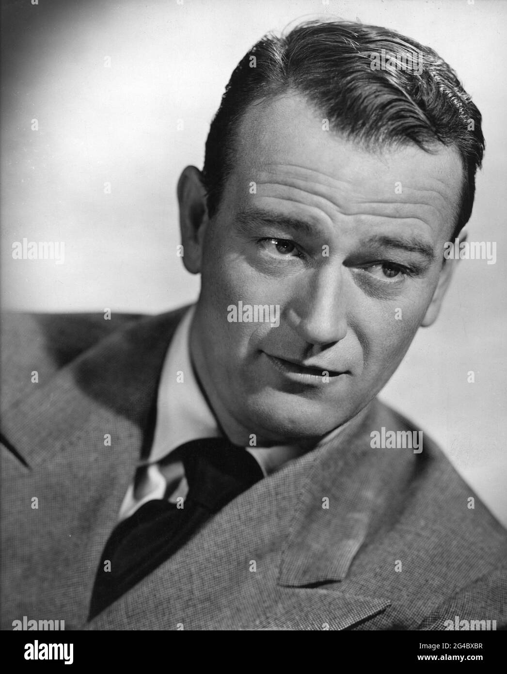 JOHN WAYNE 1946 Portrait publicitaire pour RKO radio Images Banque D'Images
