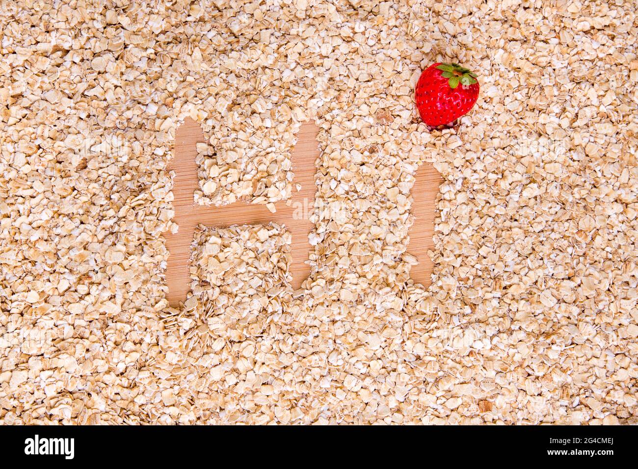 Texture de l'avoine, salut écrit au sujet de l'avoine et de la fraise comme un point de l'i Banque D'Images