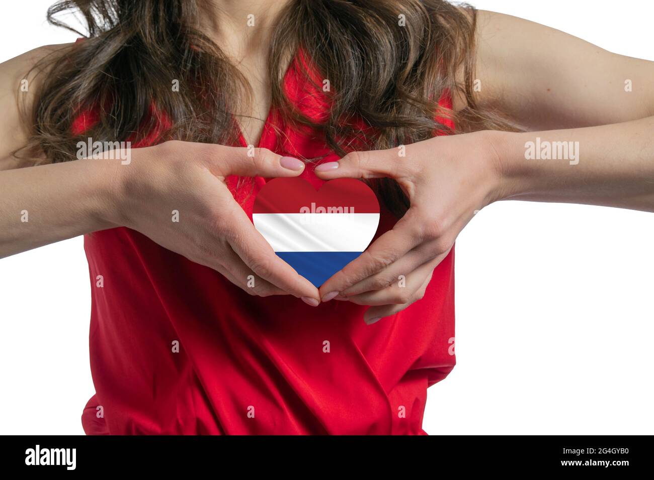 J'aime les pays-Bas. La femme tient un coeur sous la forme du drapeau des  pays-Bas sur sa poitrine. Concept de patriotisme Photo Stock - Alamy