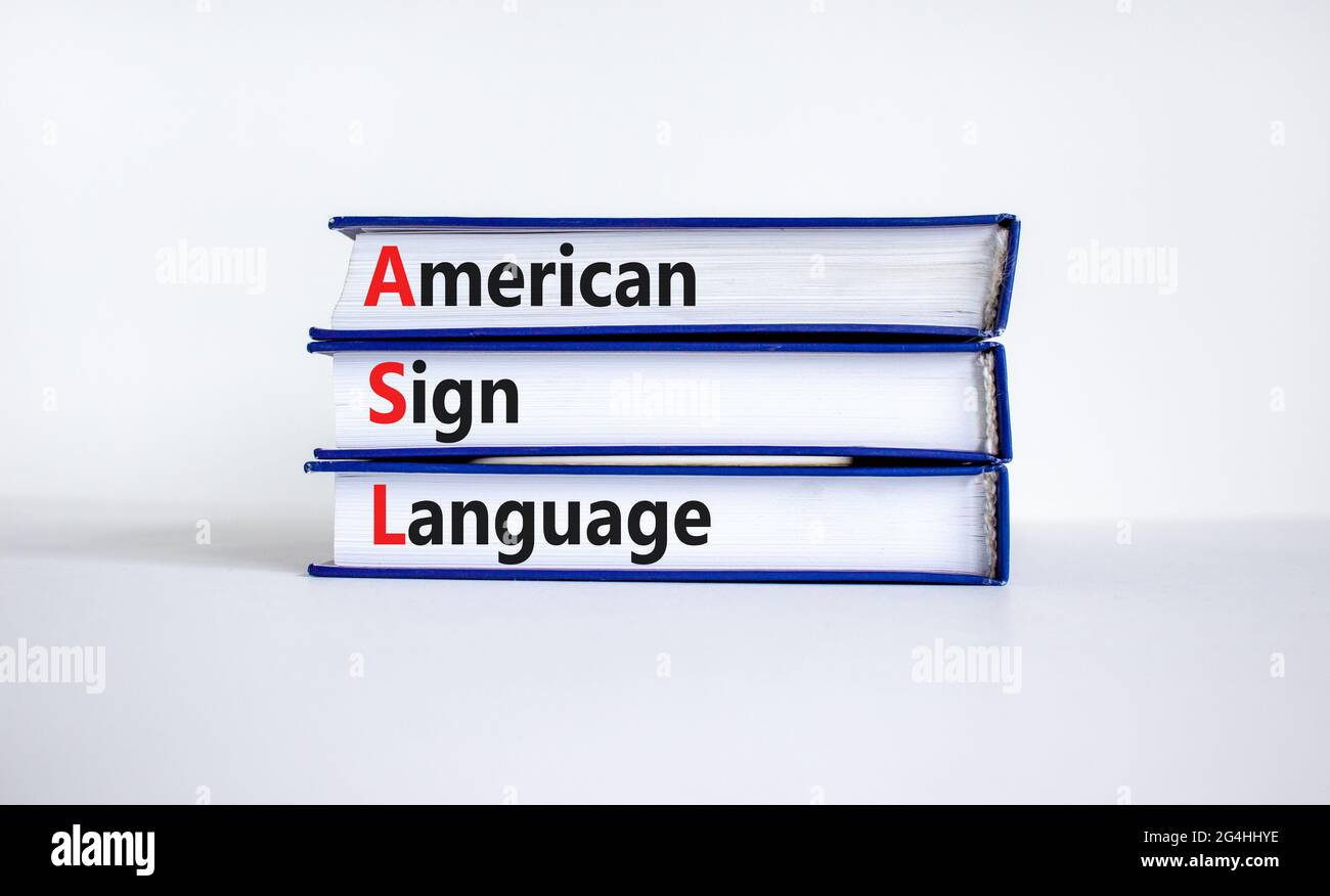 ASL, symbole de langue des signes américaine. Livres avec les mots 'ASL, american Sign Language'. Magnifique fond blanc. Médical et ASL, signe américain languag Banque D'Images