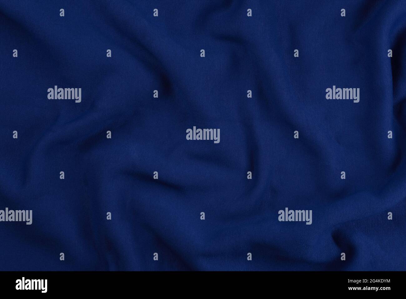 Arrière-plan en coton bleu monochrome. Gros plan sur la texture Banque D'Images