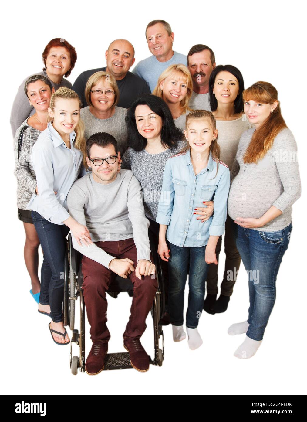 Portrait d'un grand groupe d'un âge mixte personnes souriant et s'embrassant avec les handicapés Mano. Banque D'Images