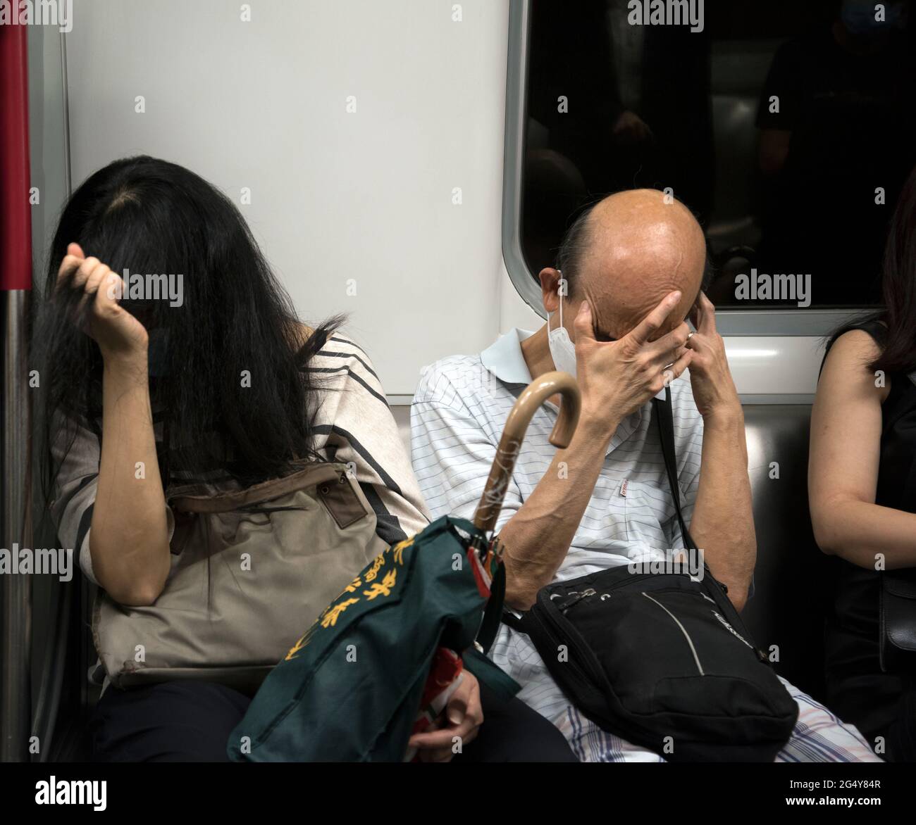 Personnes souffrant de stress et de dépression, Hong Kong, Chine. Banque D'Images