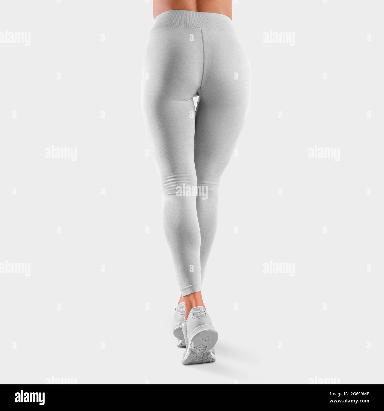 Maquette de leggings de sport sur une fille ajustée debout sur les orteils  dans les baskets, vue arrière, vêtements en tissu extensible pour la  présentation du design et du motif. Templa Photo