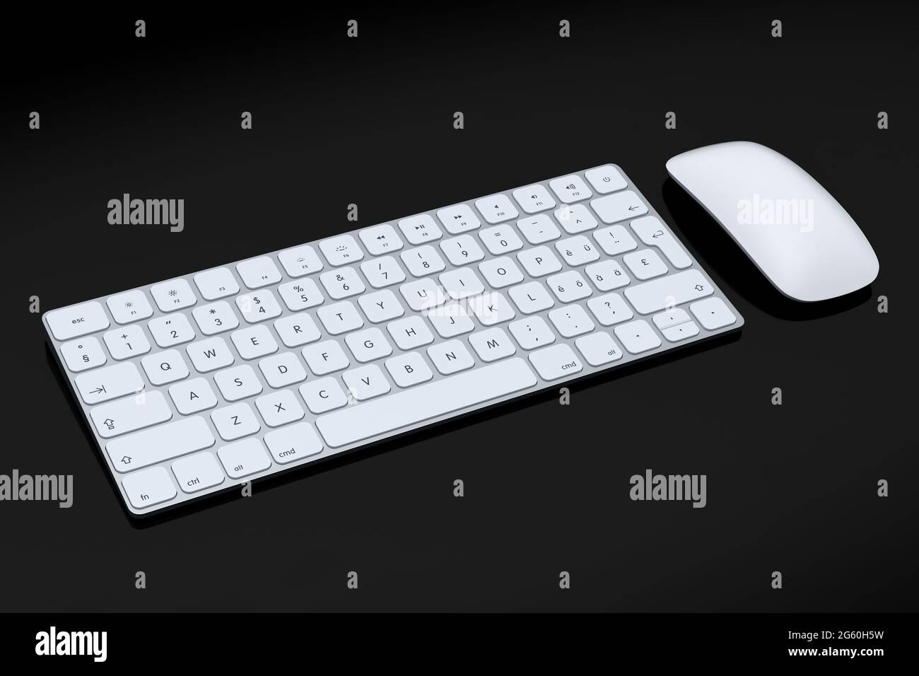 Clavier et souris modernes en aluminium blanc isolés sur fond noir. Banque D'Images Clavier et souris modernes en aluminium blanc isolés sur fond noir. Banque D'Images