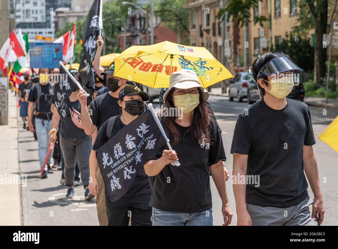 La communauté chinoise de Toronto proteste contre le Parti communiste et le gouvernement chinois. L'événement a lieu pendant les célébrations de la fête du Canada. Ils Banque D'Images