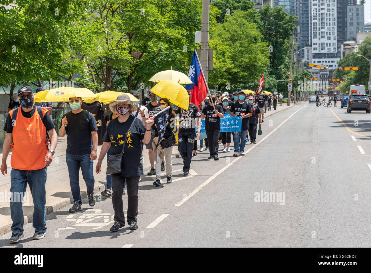 La communauté chinoise de Toronto proteste contre le Parti communiste et le gouvernement chinois. L'événement a lieu pendant les célébrations de la fête du Canada. Ils Banque D'Images