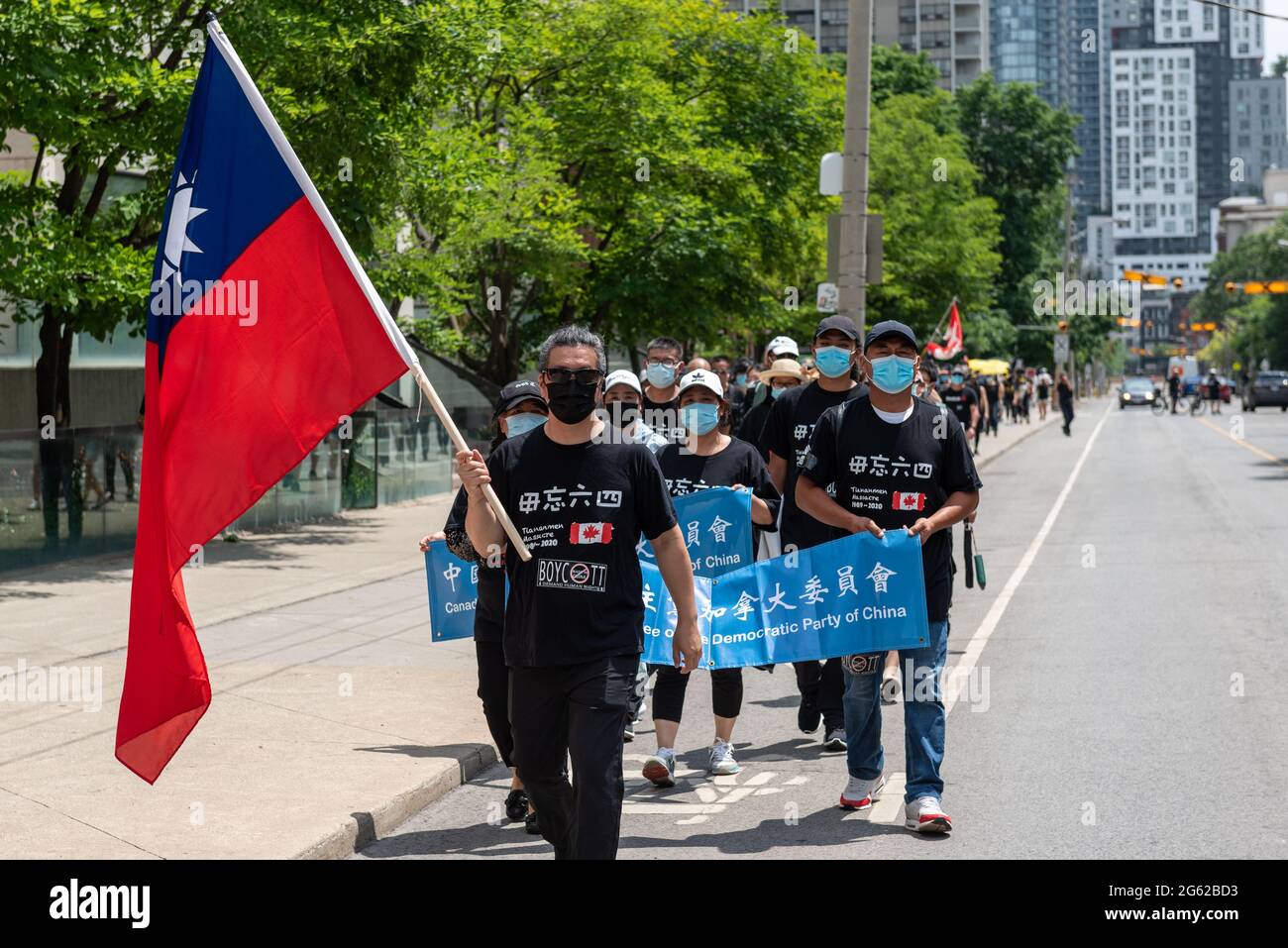 La communauté chinoise de Toronto proteste contre le Parti communiste et le gouvernement chinois. L'événement a lieu pendant les célébrations de la fête du Canada. Ils Banque D'Images