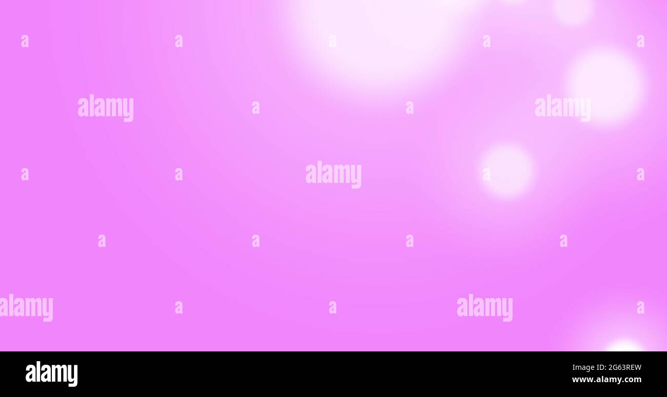 Image de taches blanches brillantes de lumière se déplaçant dans le mouvement hypnotique sur fond violet Banque D'Images