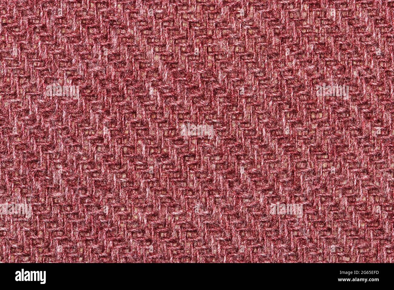 Texture de motif de laine tissée rouge blush, échantillon de nuance de couleur de tissu à pose macro plate. Banque D'Images