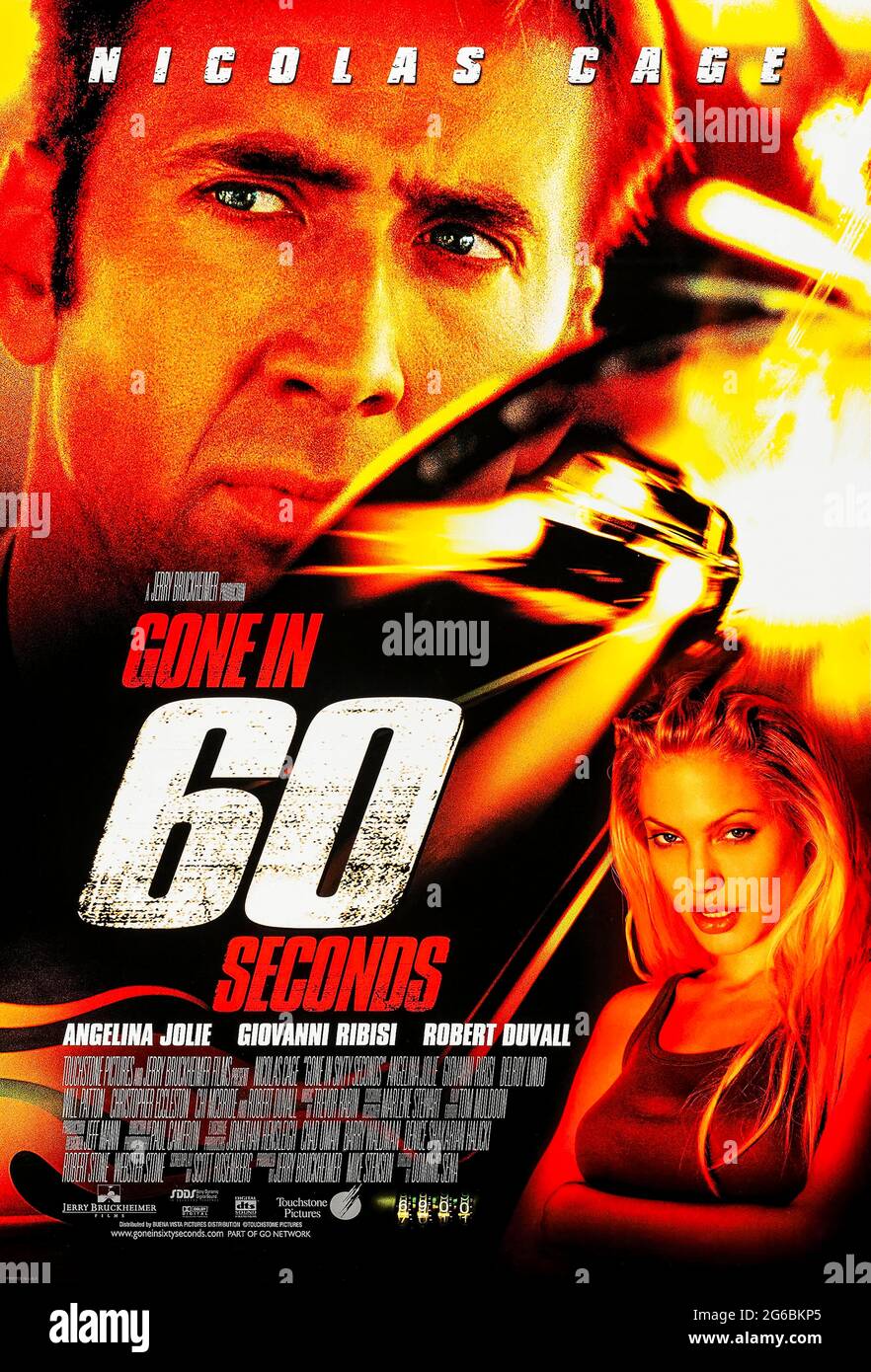 Parti en soixante secondes (2000) dirigé par Dominic Sena et avec Nicolas cage, Angelina Jolie et Giovanni Ribisi. Un voleur de voiture réformé et son équipage sont forcés de voler cinquante supervoitures en une nuit afin de sauver la vie de son frère. Banque D'Images