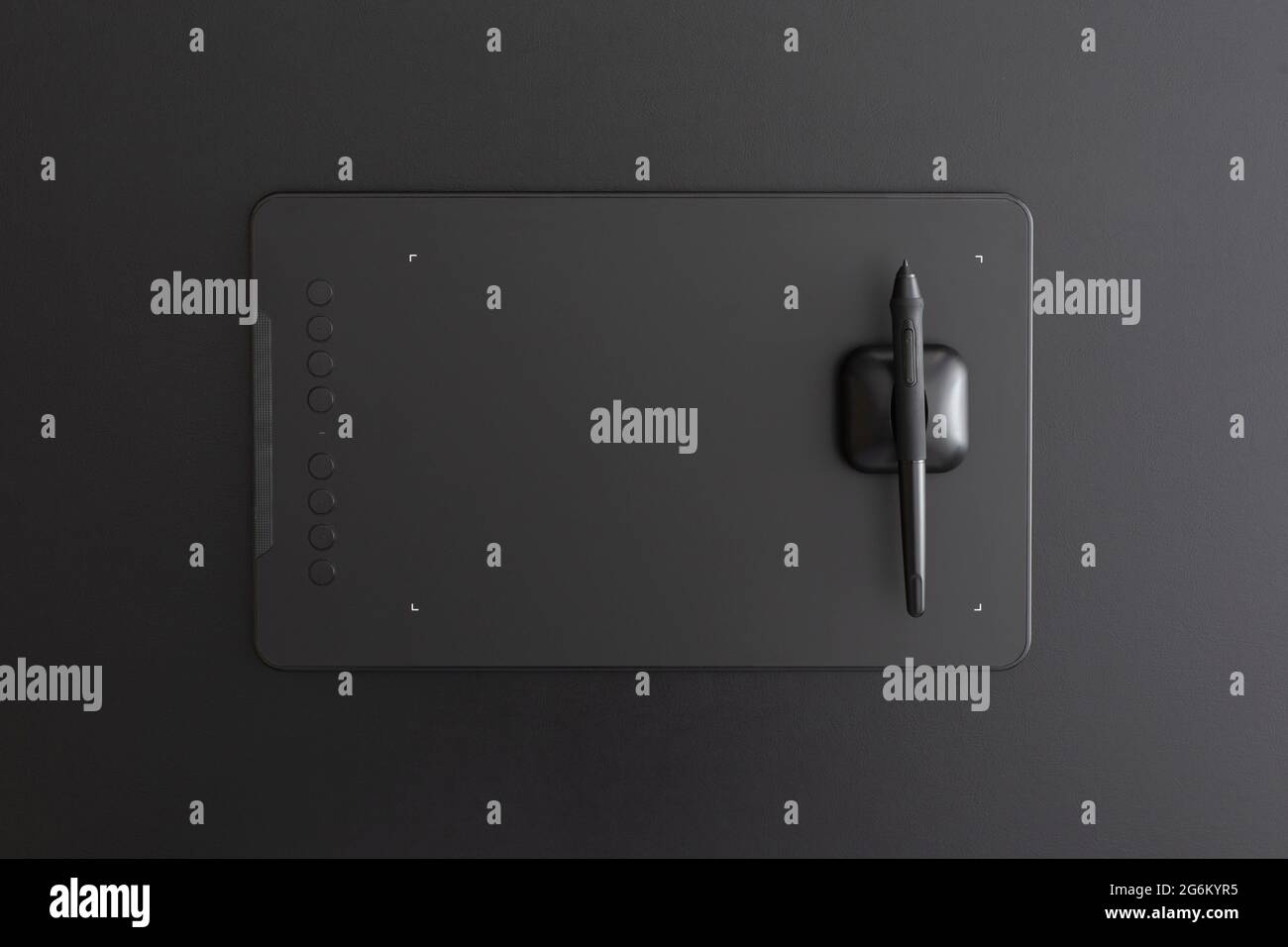 Tablette graphique sur fond en cuir noir. Concept de dessin. Composition de la pose à plat. Vue de dessus Banque D'Images