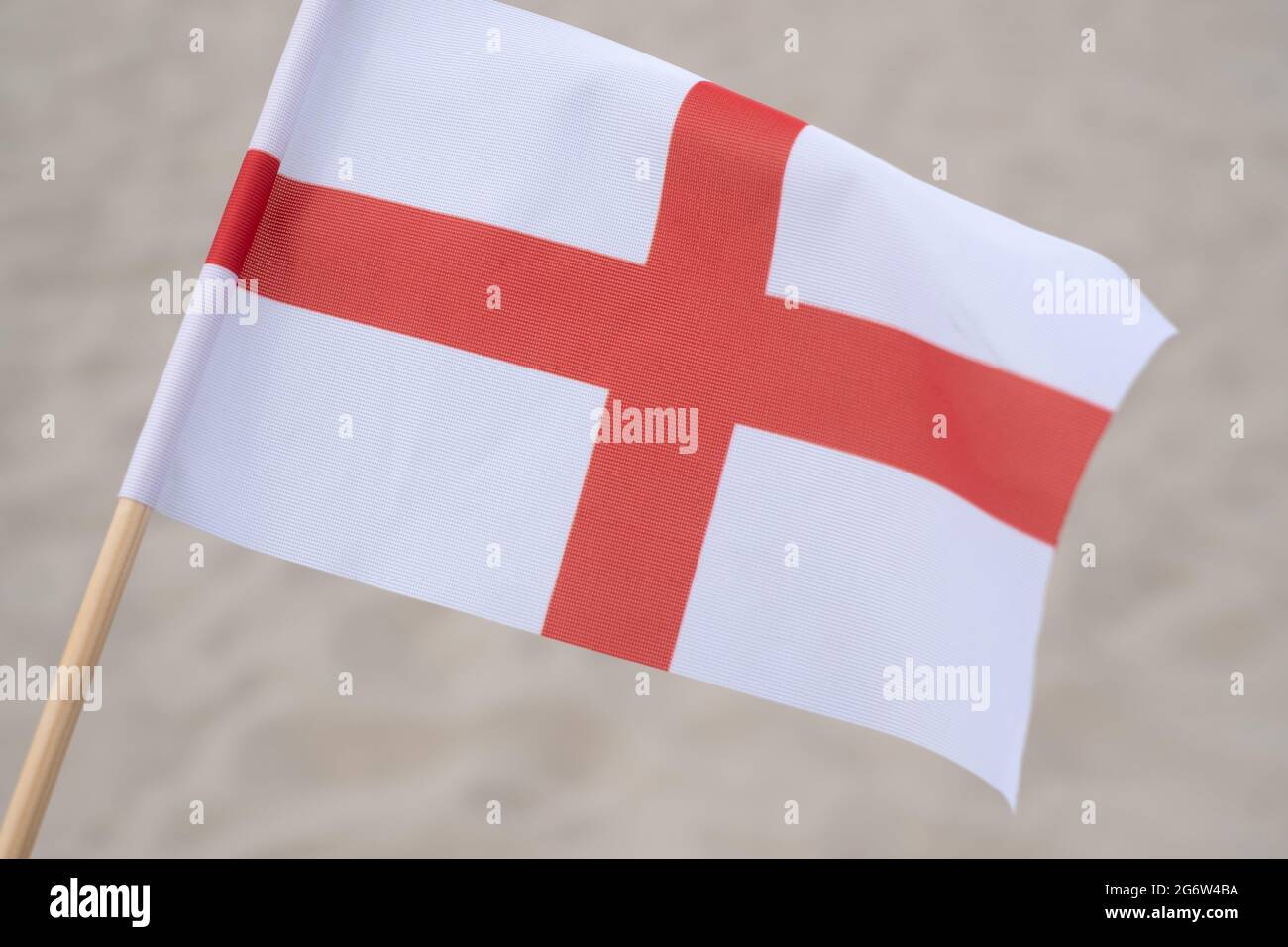 Drapeau de l'Angleterre sur fond de sable. Banque D'Images