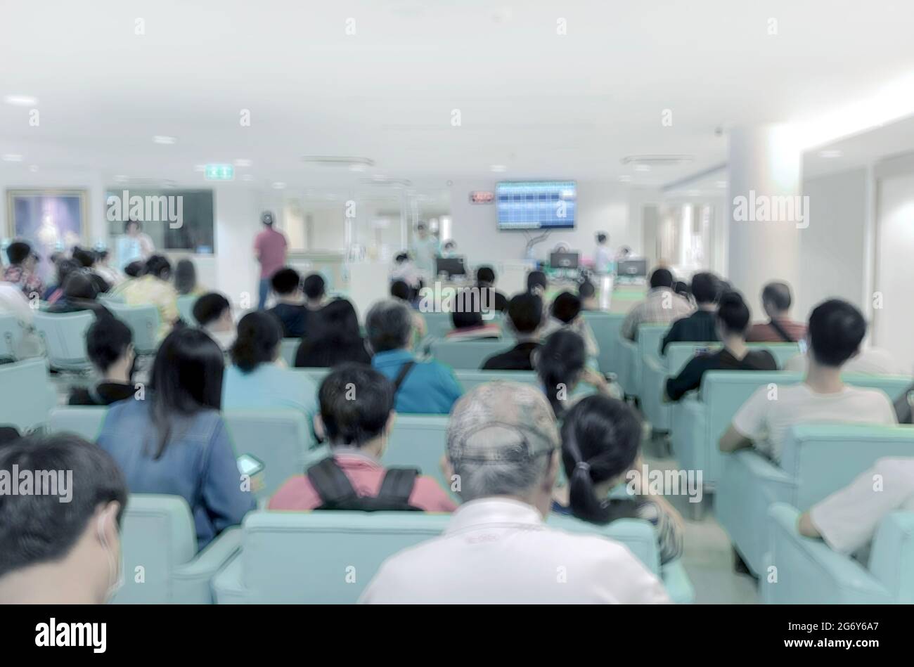 résumé flou entièrement patient en attente de vaccin hôpital lobby pour l'arrière-plan Banque D'Images