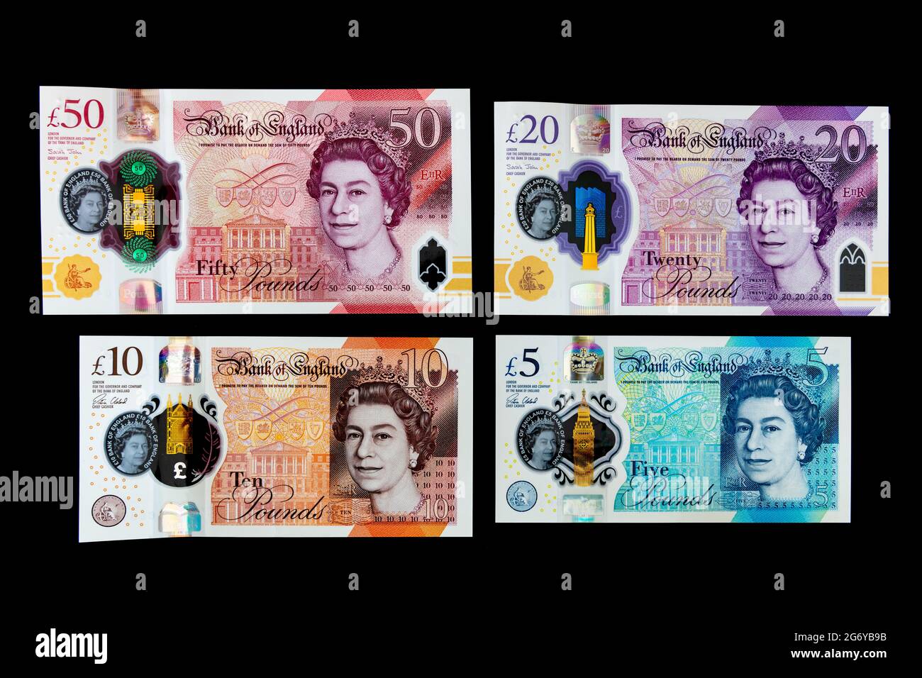 Banque d'Angleterre Collection complète de nouveaux billets en polymère sur fond noir Banque D'Images