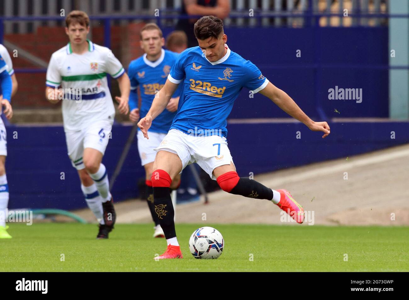 Birkenhead, Royaume-Uni. 10 juillet 2021. Ianis Hagi des Rangers joue le ballon lors du match amical d'avant-saison entre les Tranmere Rovers et les Rangers au parc de Prenton le 10 juillet 2021 à Birkenhead, en Angleterre. (Photo de Richard Ault/phcimages.com) Credit: PHC Images/Alamy Live News Banque D'Images