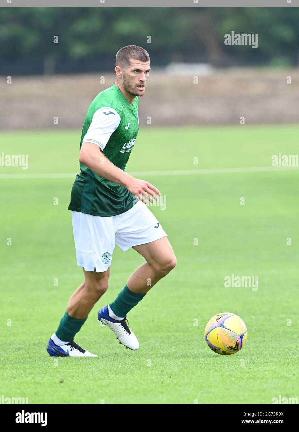 Tranent, Ormiston, East Lothian.Scotland. Royaume-Uni .3 juillet 21 Hibernian vs Dunfermline match amical avant la saison. Alex Gogic de Hibernian FC 2021-2022 Banque D'Images