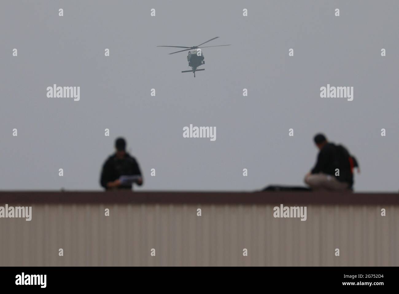 30 juin 2019-Osan, Corée du Sud-Garde de sécurité de la Maison Blanche vérifient leur frontière pour la visite du président Donald Trump à la base militaire d'Osan, en Corée du Sud. Banque D'Images