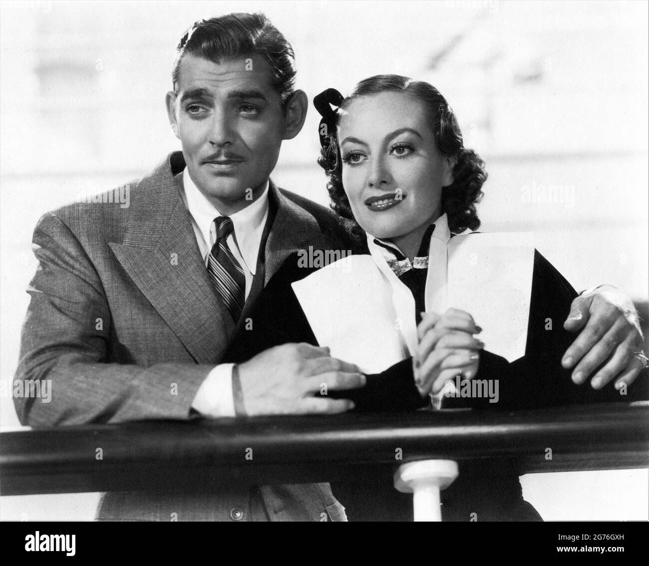 CLARK PIGNON et JOAN CRAWFORD en CHAÎNE 1934 réalisateur CLARENCE BROWN Story Edgar Selwyn scénario John Lee Mahin robes Gilbert Adrian Metro Goldwyn Mayer Banque D'Images