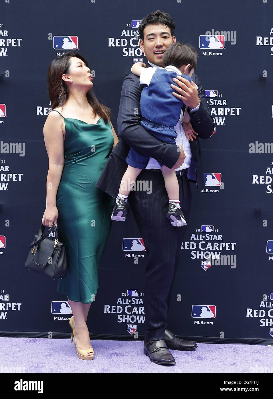 Denver, États-Unis. 13 juillet 2021. Le pichet Yusei Kikuchi pose avec sa famille au MLB All-Star Red Carpet Show à Coors Field à Denver, Colorado, le mardi 13 juillet 2021. Photo de Bob Strong/UPI crédit: UPI/Alay Live News Banque D'Images