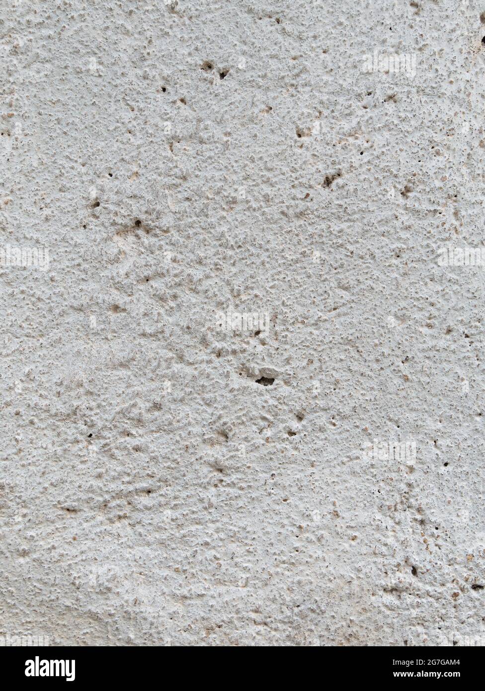 Béton gris avec fond monochrome peint par une lumière de plâtre. Maison en pierre noire et blanche texture de clôture calcaire. Copier l'espace pour le texte des Banque D'Images