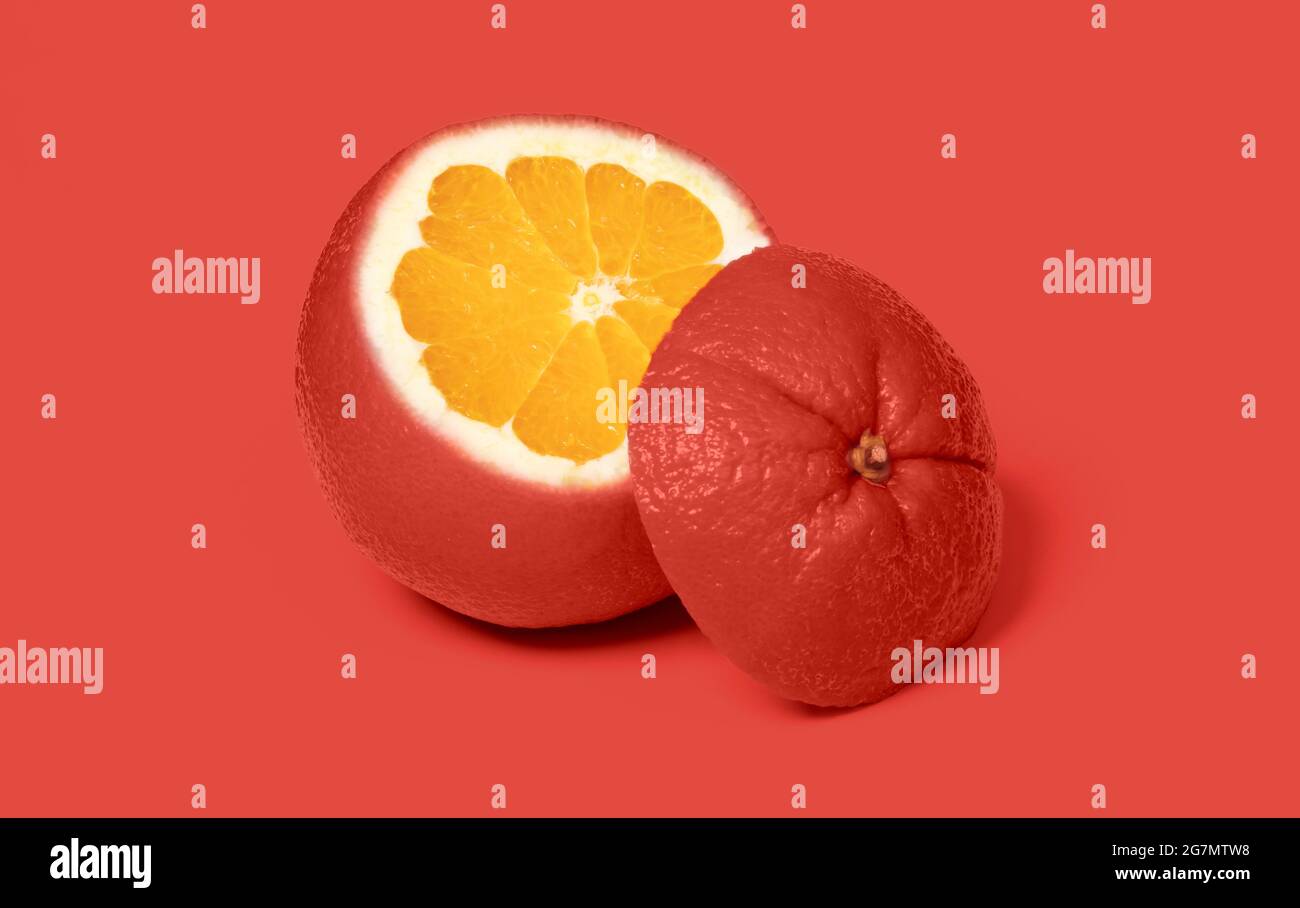 Rouge étrange tranché orange isolé sur un fond rose Banque D'Images