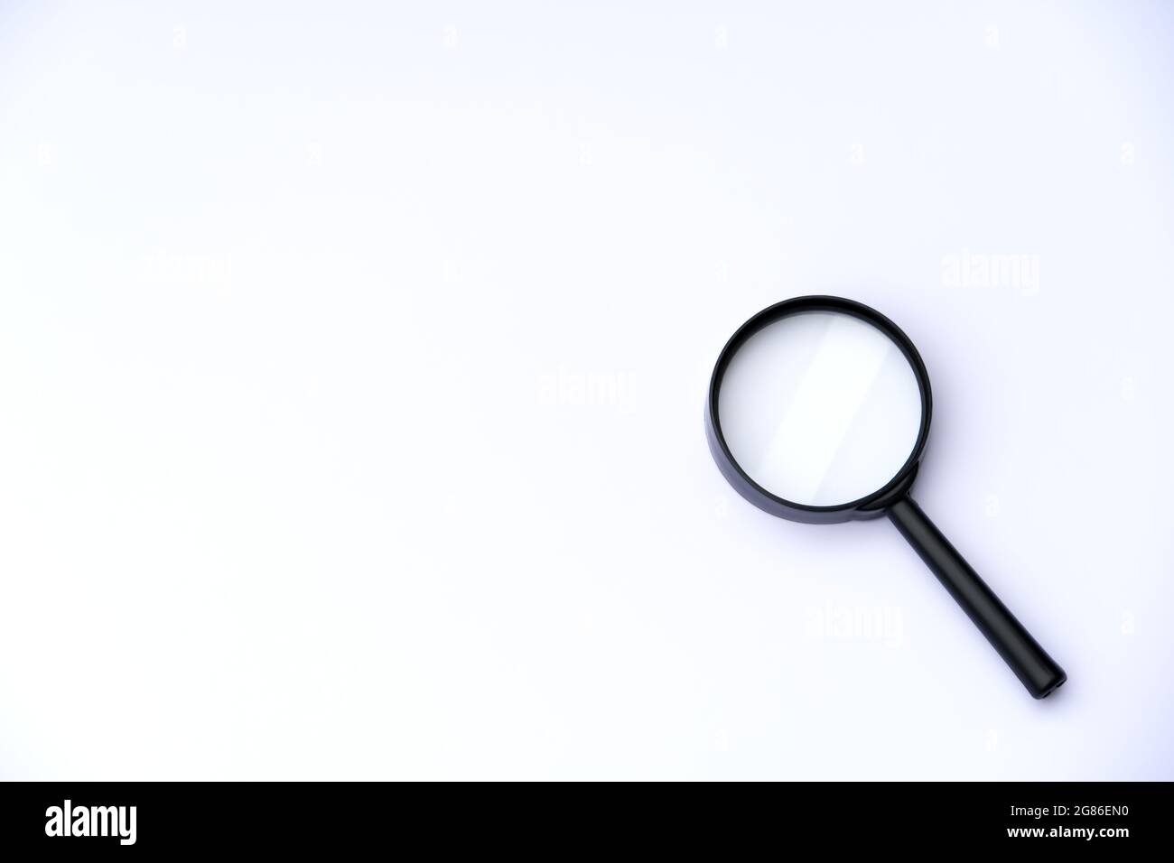 Loupe sur fond blanc Banque D'Images