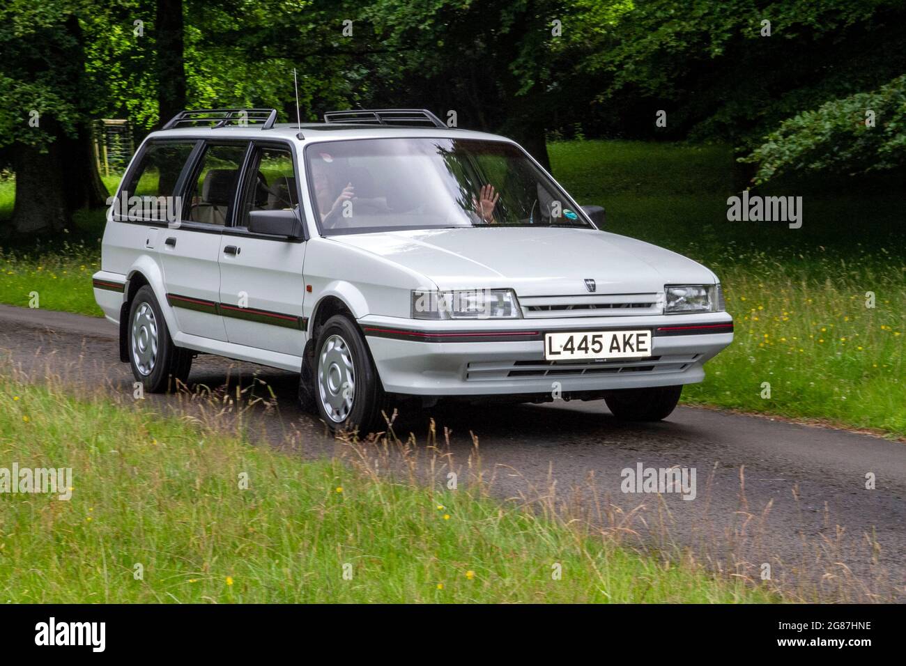 1993 années 90 années 90 blanc British Rover DLX Turbo au spectacle « The Cars the Star Show » à Holker Hall & Gardens, Grange-over-Sands, Royaume-Uni Banque D'Images