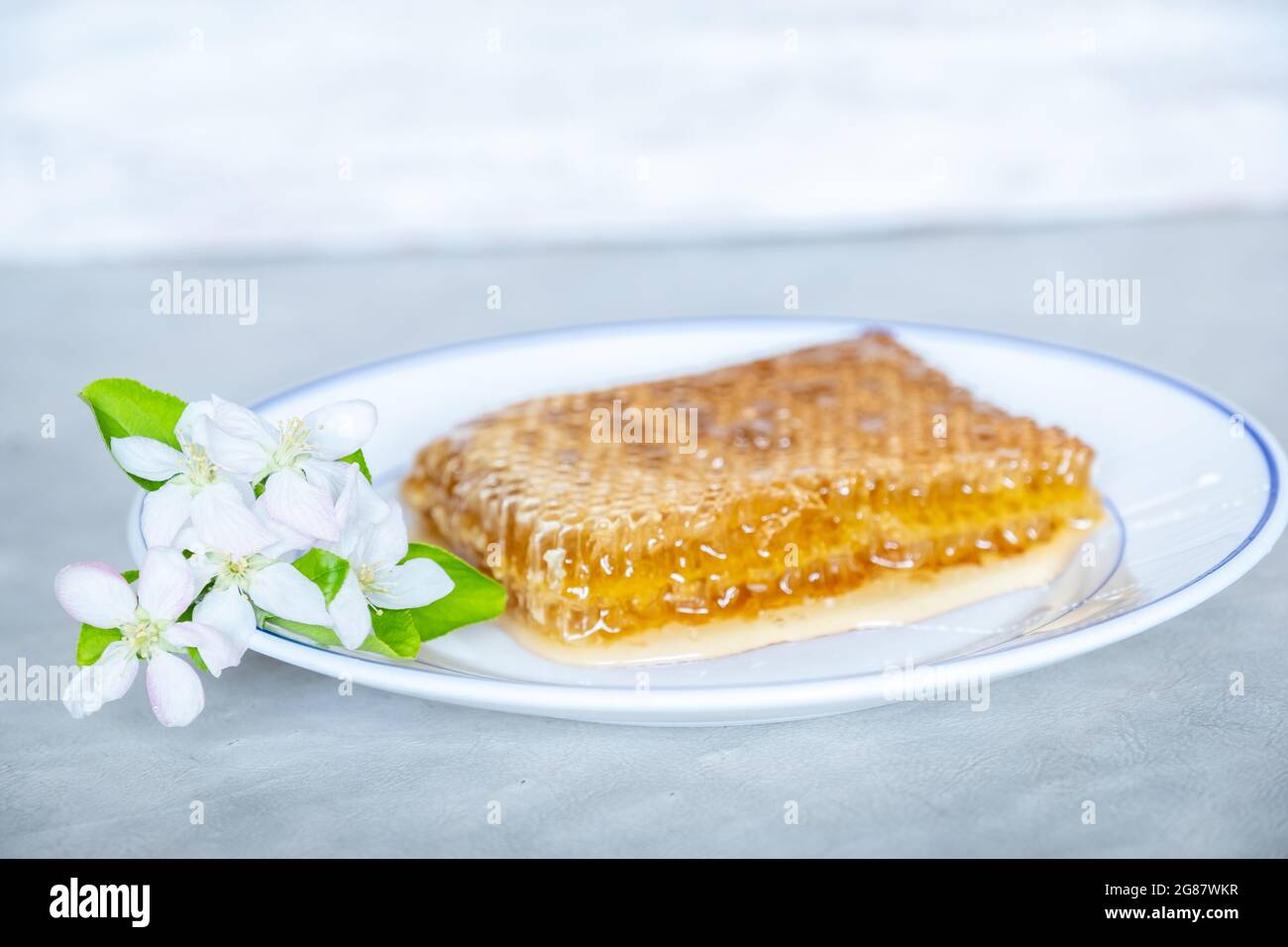 Miel naturel aux roses et aux agrumes Banque D'Images