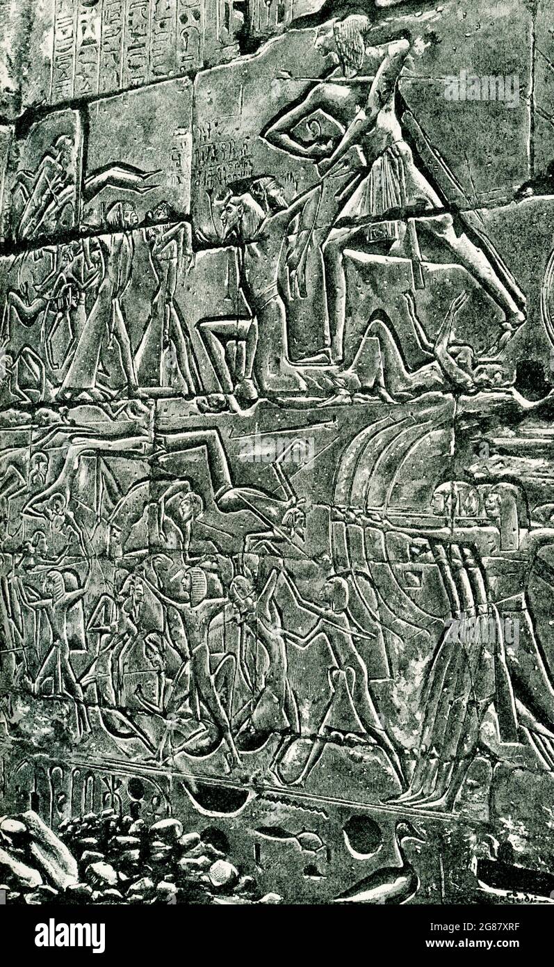 La légende accompagnant cette illustration de 1903 dans le livre de Gaston Maspero sur l’histoire de l’Égypte est la suivante : « Ramses III lie les chefs des Libyens à partir d’une photographie de Beato ». Banque D'Images