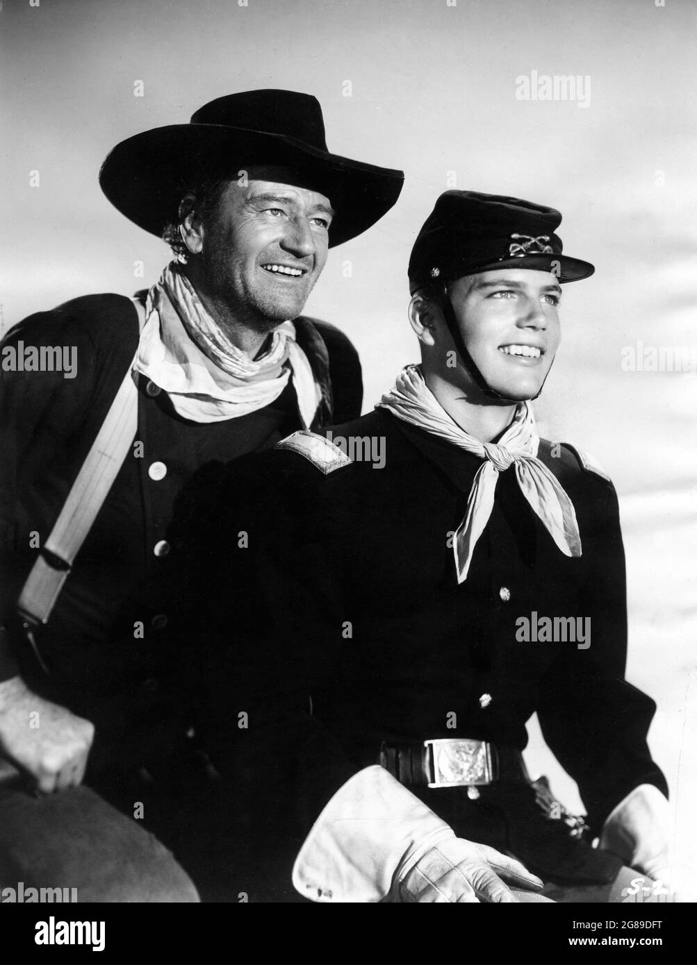 JOHN WAYNE et son fils PATRICK WAYNE Publicité Portrait dans LES ...