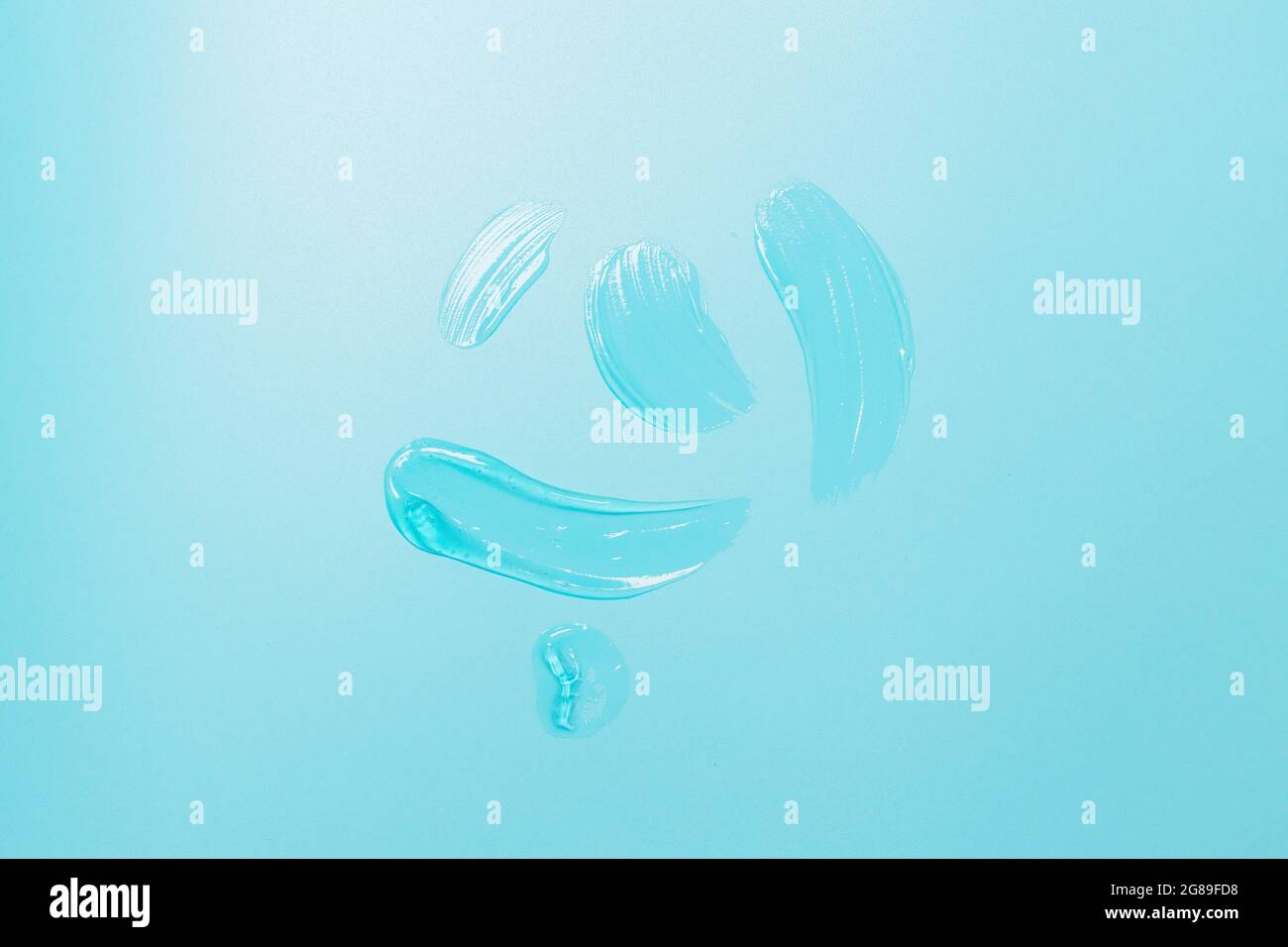 Gel liquide cosmétique texture taches fond transparent, soin de la peau beauté concept Banque D'Images