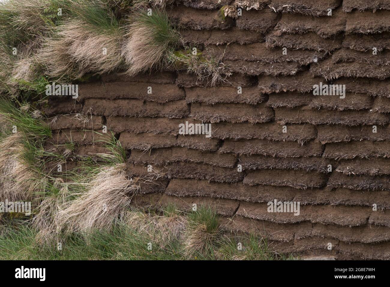 Tourfs empilées, maison de Peat, Saenautasel, Islande Banque D'Images