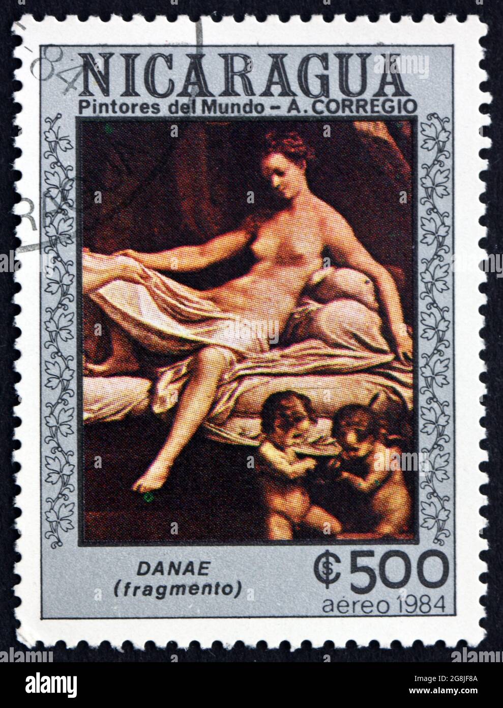 NICARAGUA - VERS 1984: Un timbre imprimé au Nicaragua montre Danae, détail, peinture de Correggio, peintre italien, vers 1984 Banque D'Images