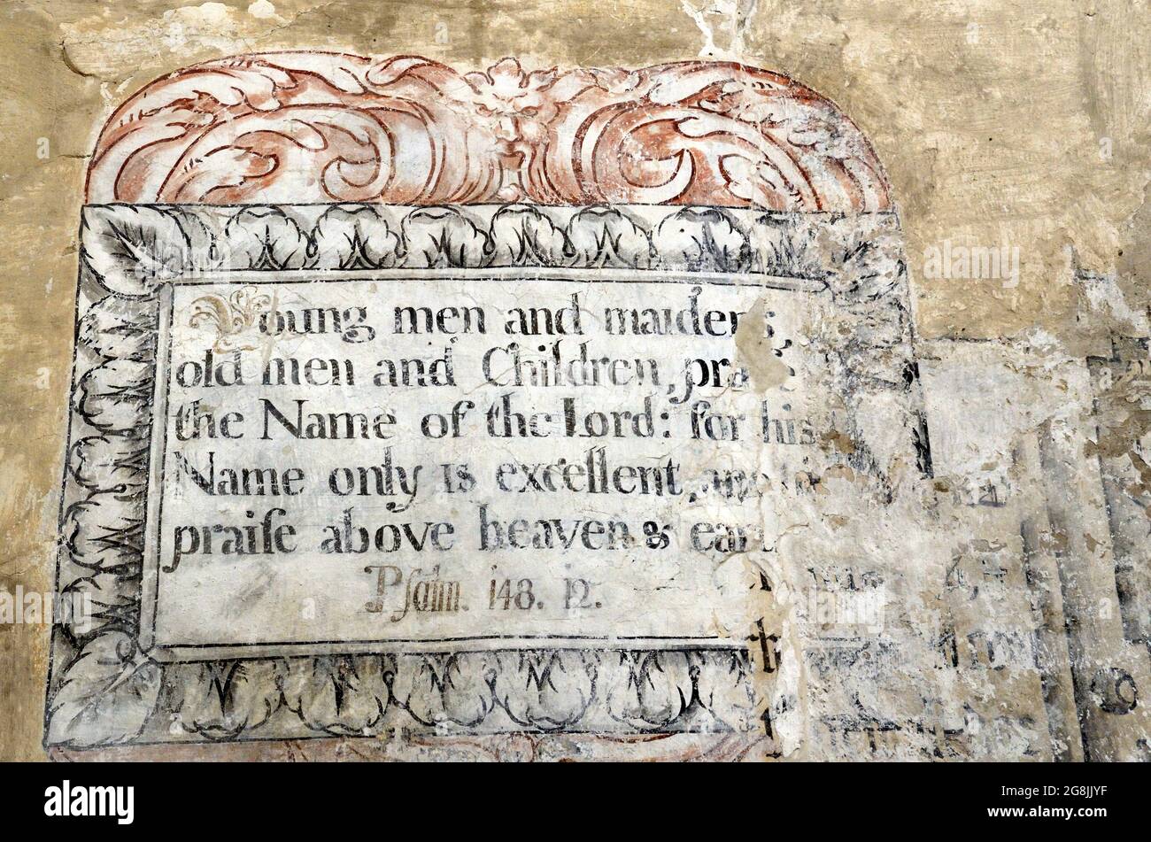 Peinture ancienne et script sur le mur de l'église de porte d'abbaye Herefordshire Angleterre Royaume-Uni Banque D'Images
