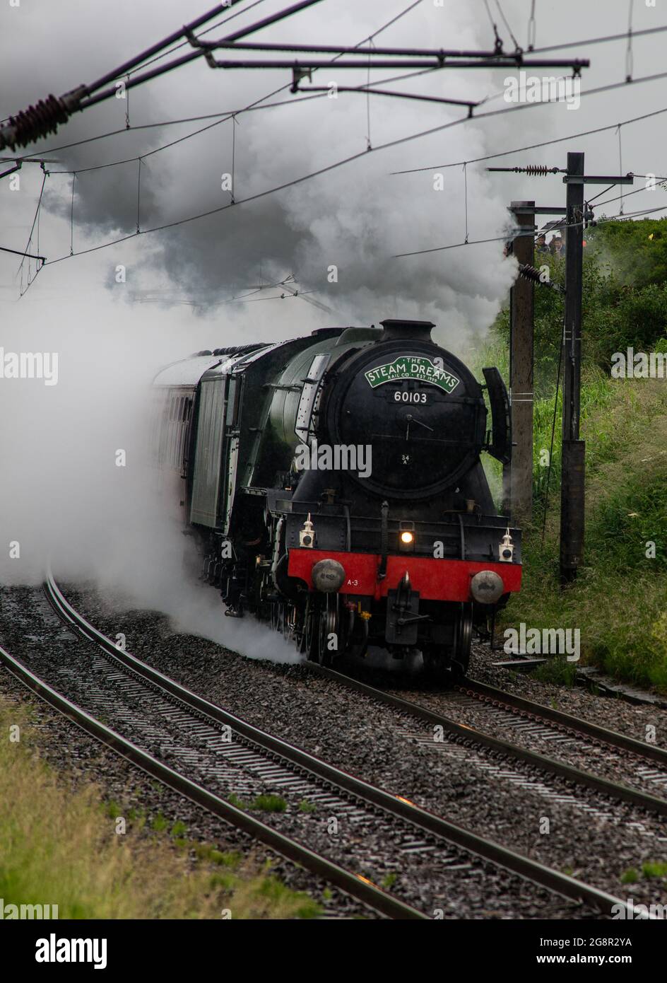 Le train le plus célèbre au monde le Flying Scotsman en direction nord de Berwick upon Tweed Banque D'Images