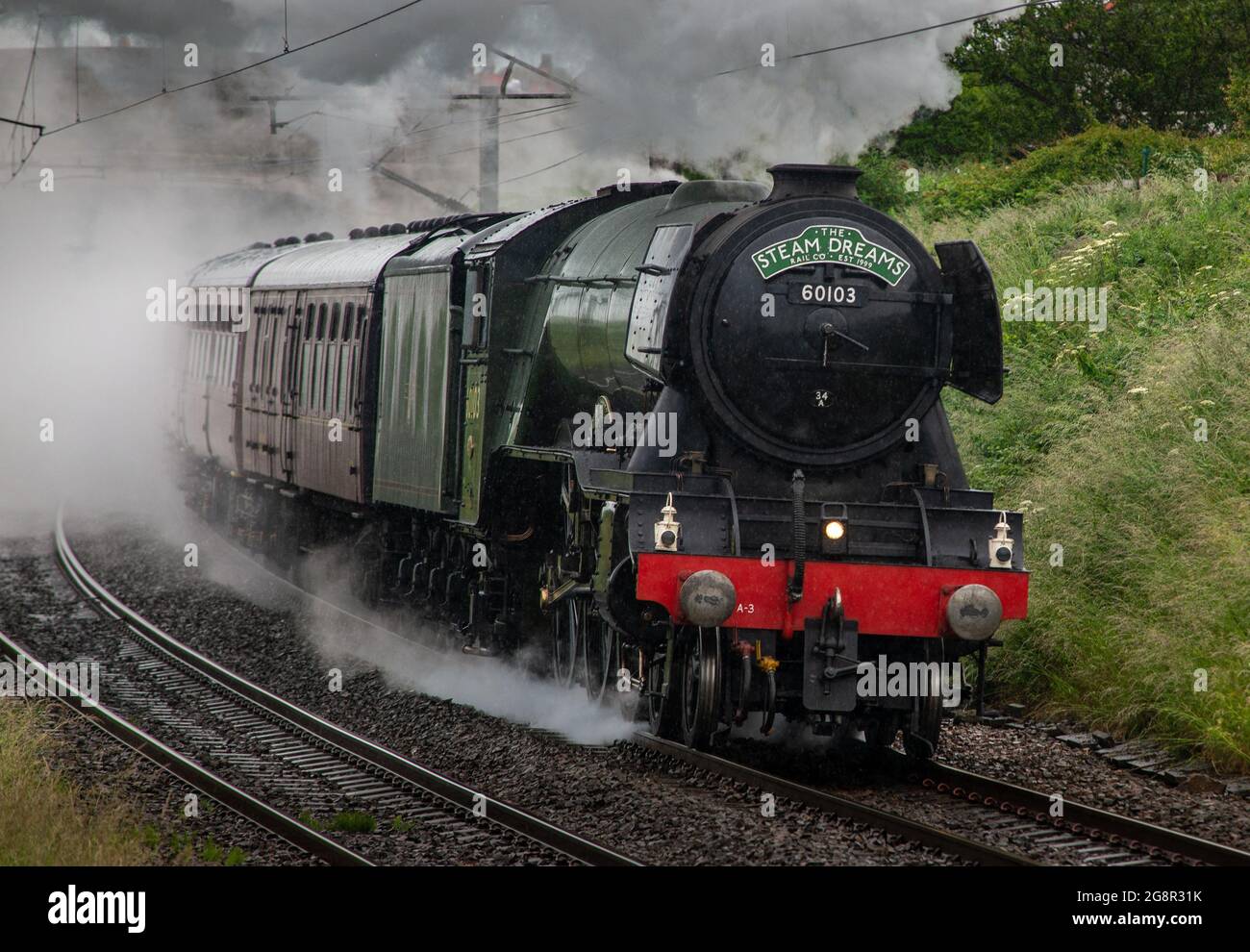 Le train le plus célèbre au monde le Flying Scotsman en direction nord de Berwick upon Tweed Banque D'Images