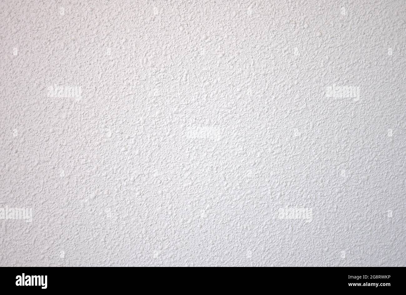 détail d'un mur peint en blanc à l'aide de la technique de gotele Banque D'Images
