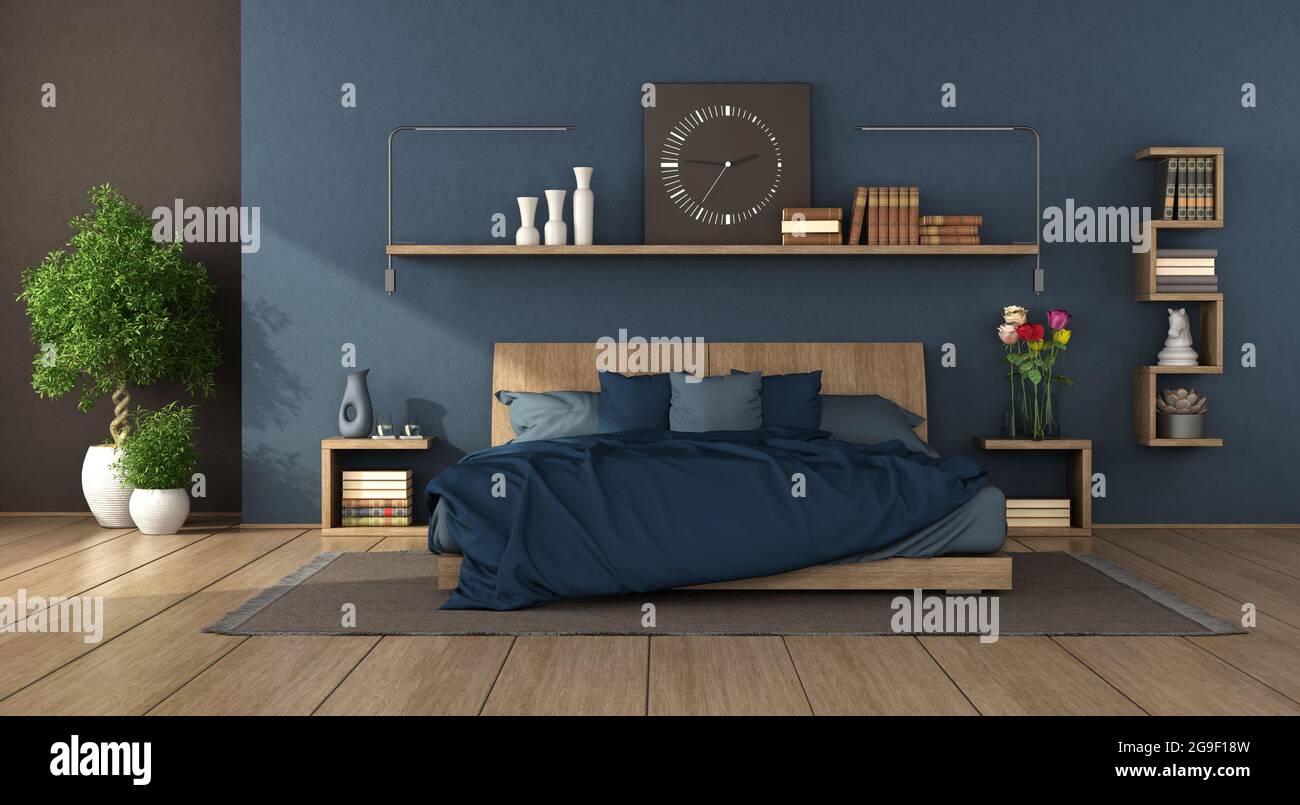 Lit double en bois dans une chambre moderne bleue avec étagères, livres et  objets de décoration - rendu 3d Photo Stock - Alamy