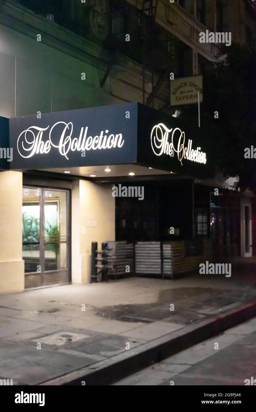 Extérieur de la collection, 24 heures Cokorking et espace de bureau, panneau allumé la nuit, 527 W 7th St, Los Angeles, CA, États-Unis Banque D'Images
