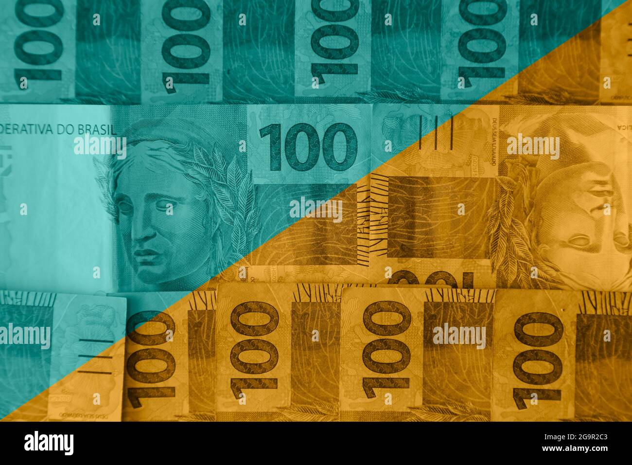 Brésil Money concept - couleur verte et jaune et mélange de cent reais de factures Banque D'Images