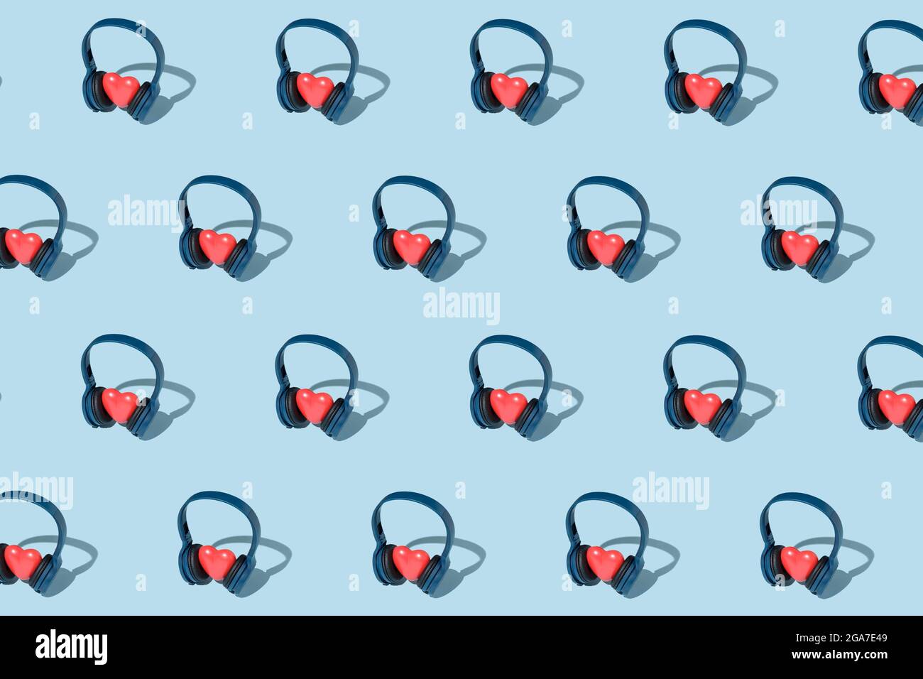Motif avec écouteurs et coeurs concept à propos de l'écoute de la musique avec les coeurs. Fête contemporaine. Banque D'Images