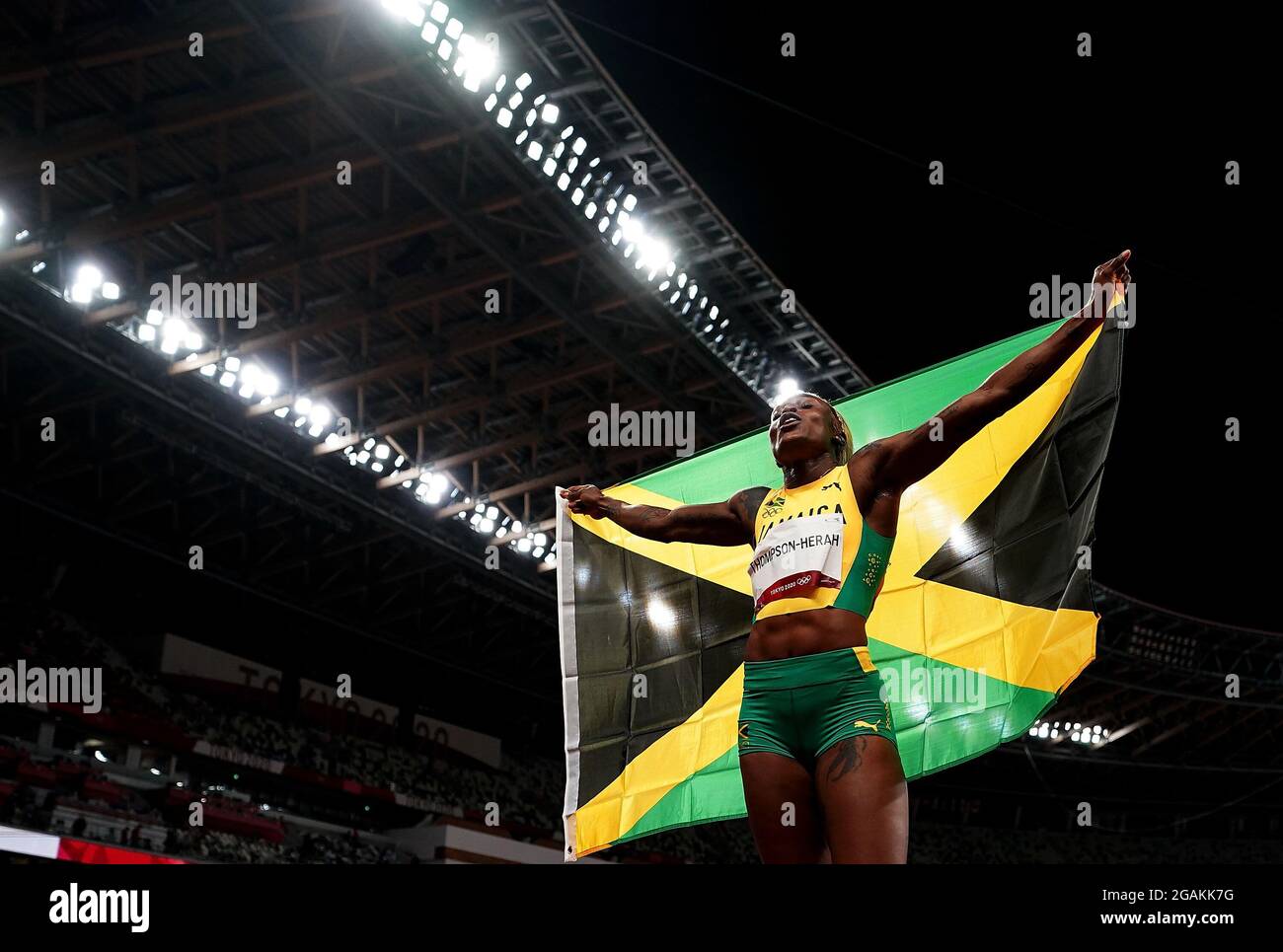 Tokyo, Japon. 31 juillet 2021. Elaine Thompson-Herah, de la Jamaïque, réagit lors de la finale du 100m féminin aux Jeux Olympiques de Tokyo 2020 à Tokyo, au Japon, le 31 juillet 2021. Crédit: Lui Siu Wai/Xinhua/Alay Live News Banque D'Images