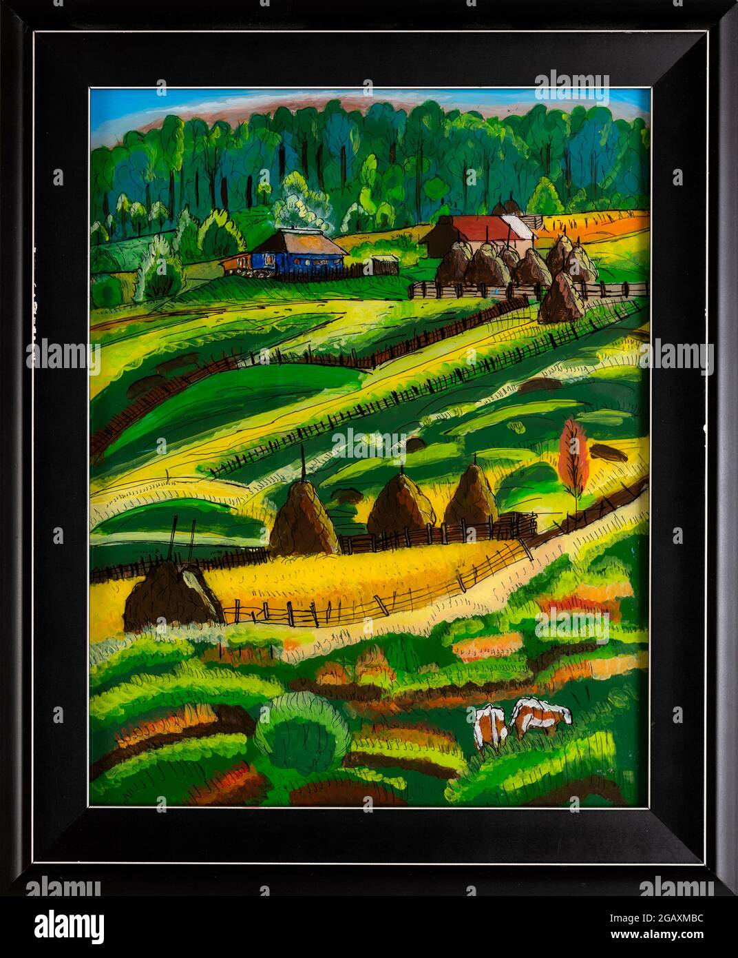 Peinture en verre inversé encadrée d'une ferme de campagne dans la région de Maramures en Roumanie. Peinture colorée naïve de paysage vallonné. Banque D'Images