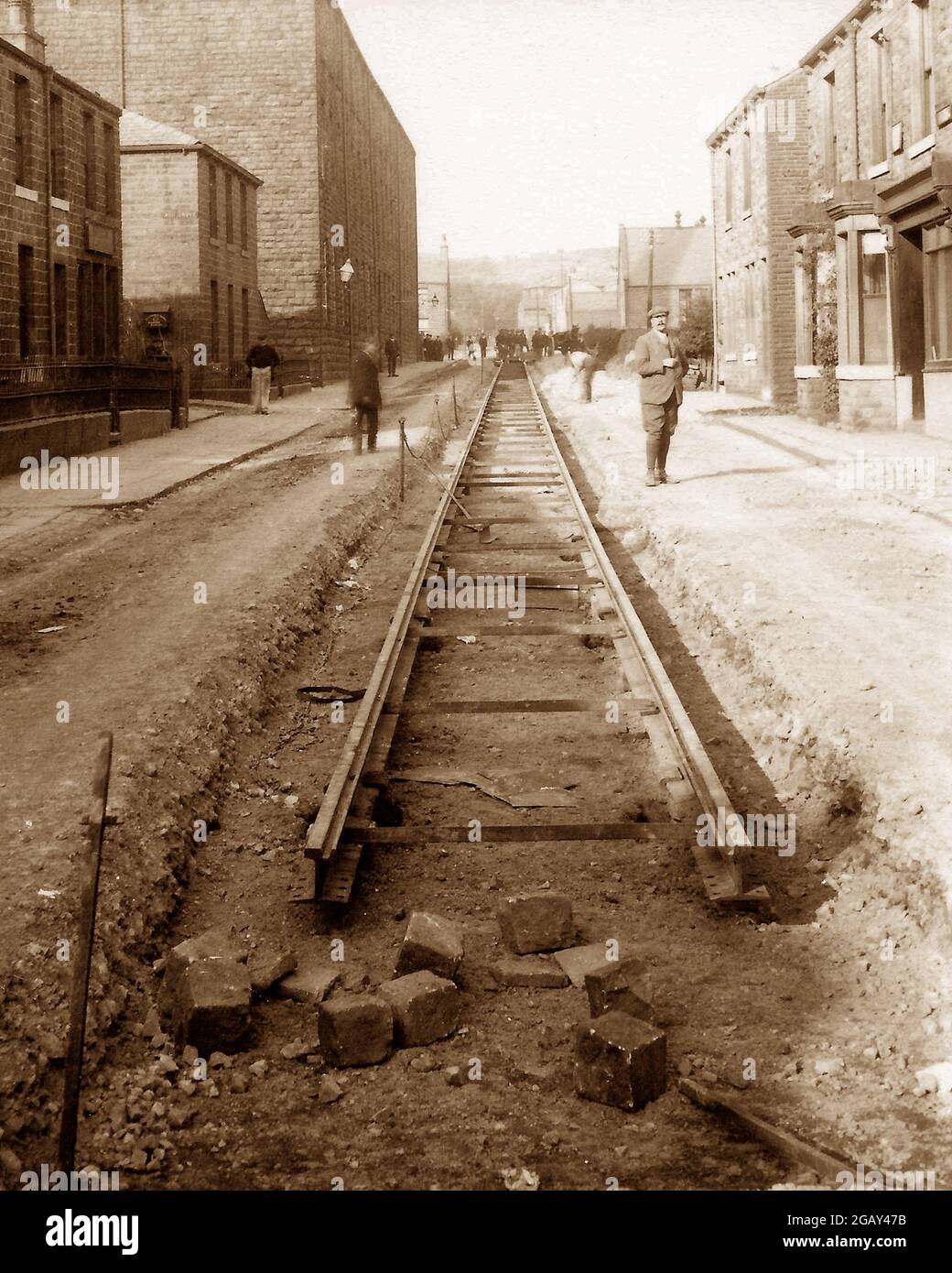 Pose de voies de tramway à Water, début 1900 Banque D'Images