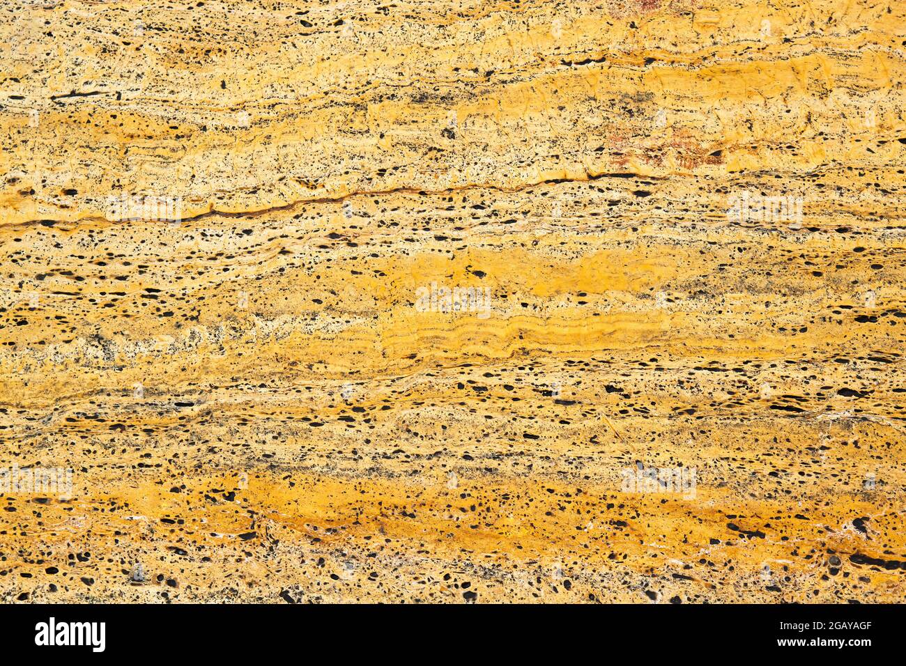 Détail de la texture des carreaux de marbre jaune travertin Banque D'Images