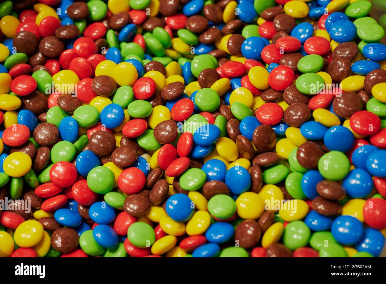photo de fond de lentilles de chocolat multicolores Banque D'Images