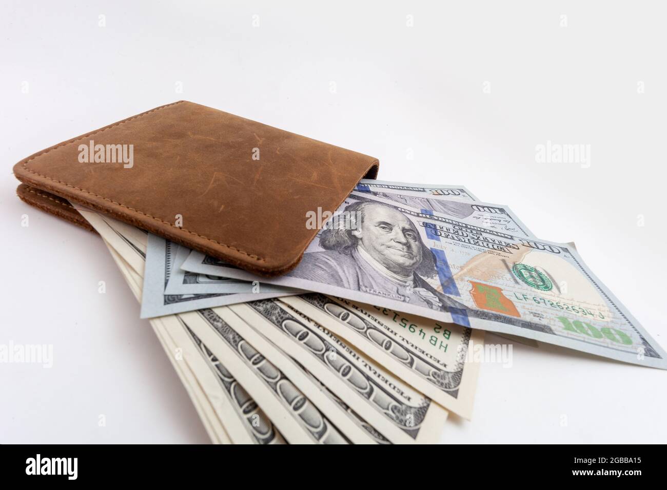 porte-monnaie avec des dollars qui s'en sortent Banque D'Images