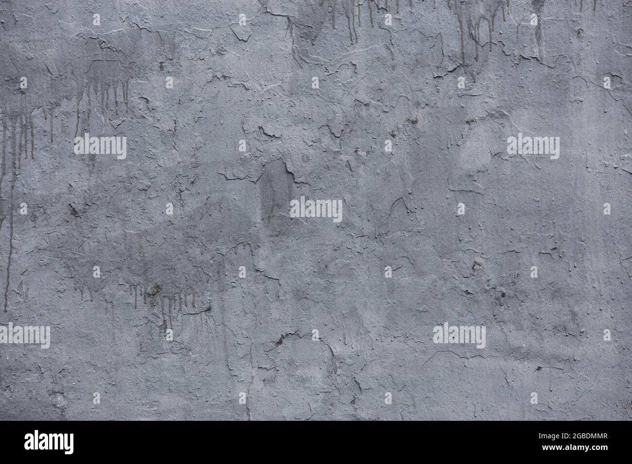 mur en béton peint en gris avec taches - fond plat et texture. Banque D'Images